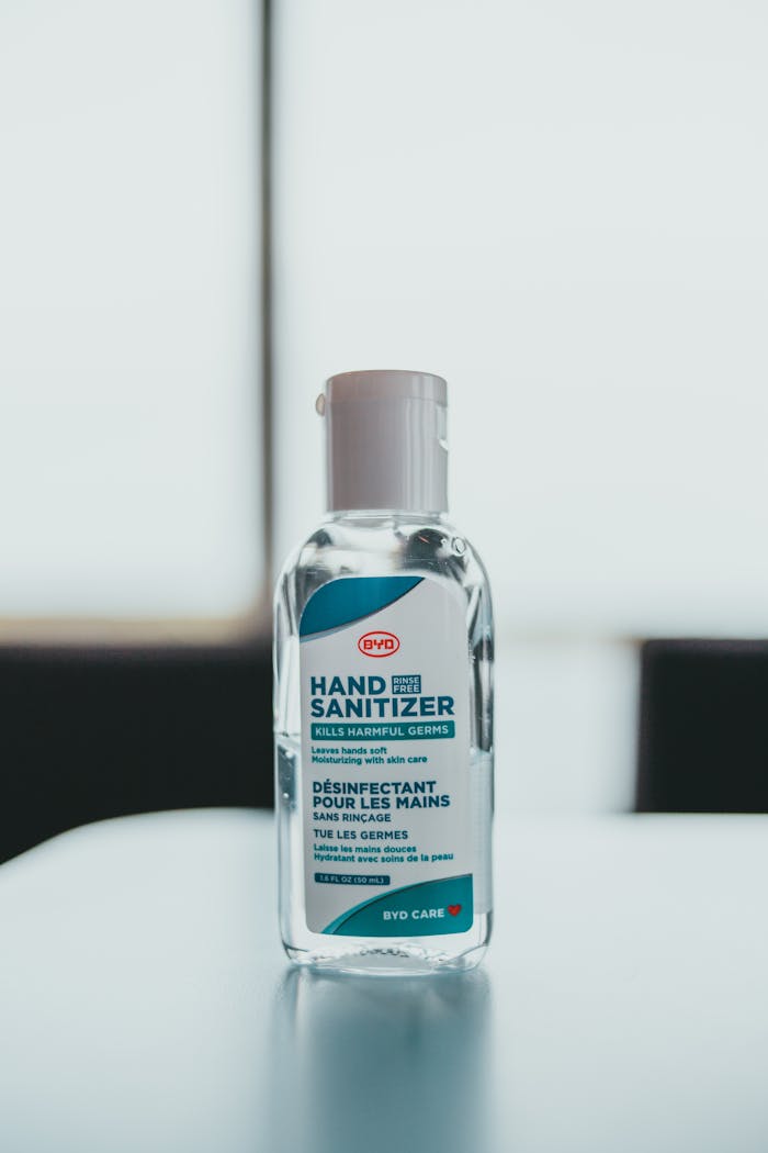 A detailed close-up image of a BYD hand sanitizer bottle focused on cleanliness and hygiene.